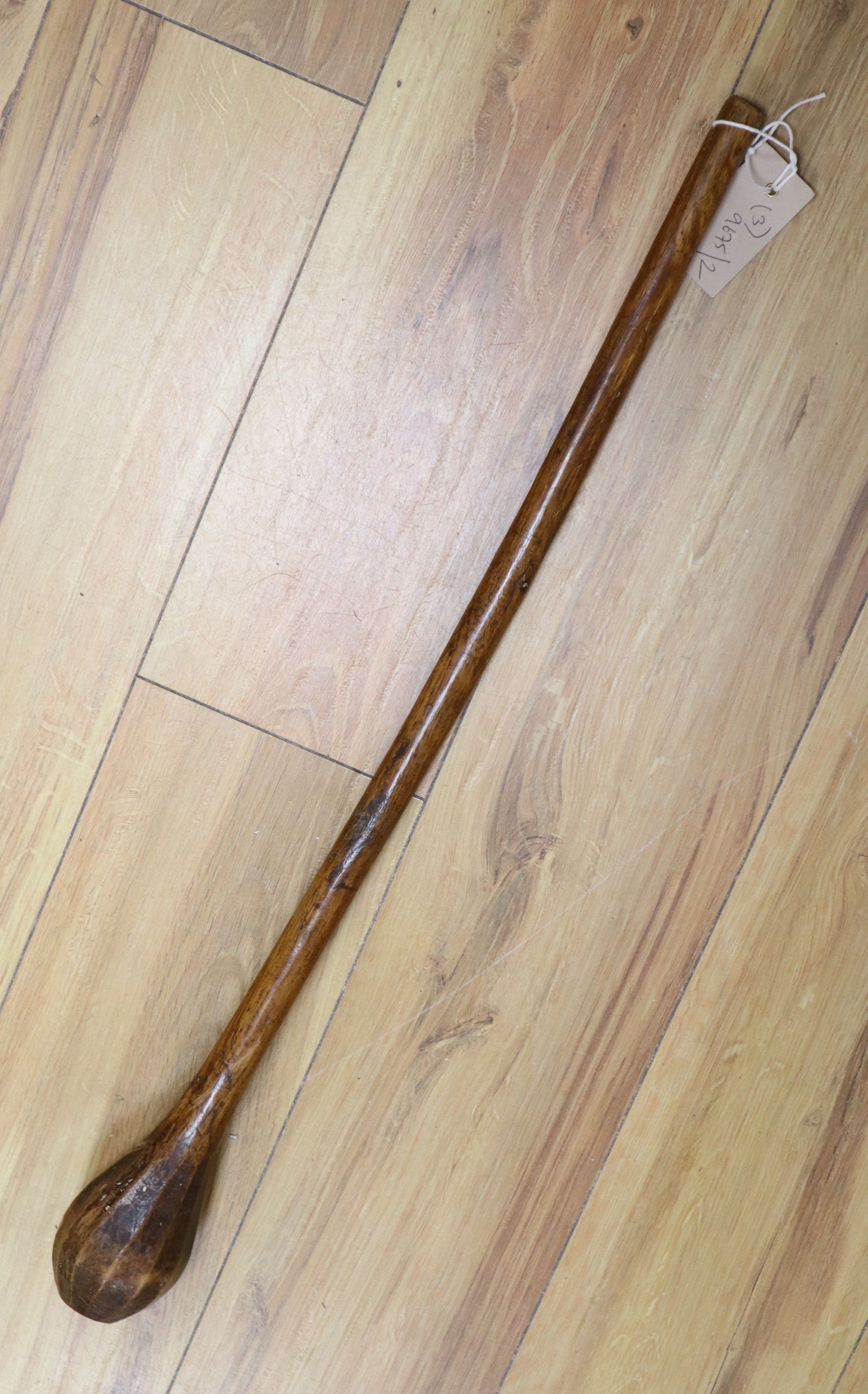 A kukri, an oak inkstand and a tribal throwing club